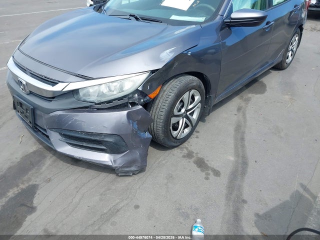 Auction sale of the 2016 Honda Civic Lx, vin: 19XFC2F54GE002934, lot number: 44976074