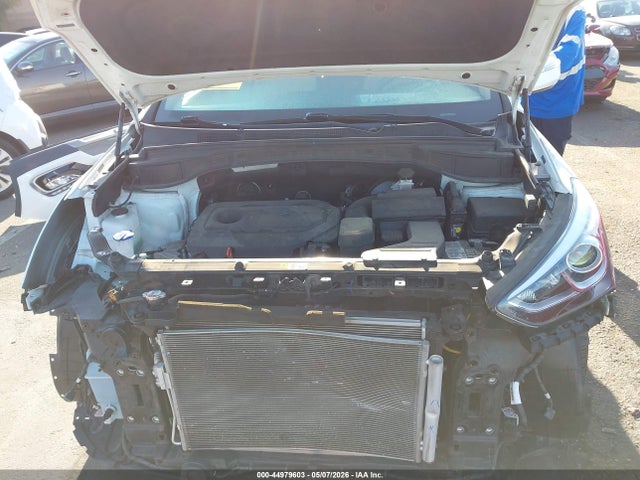 5NMZU3LB6HH051153 Hyundai Santa Fe Sport 2.4l