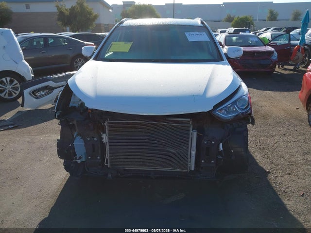 5NMZU3LB6HH051153 Hyundai Santa Fe Sport 2.4l