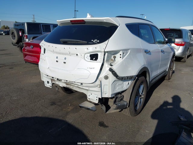 5NMZU3LB6HH051153 Hyundai Santa Fe Sport 2.4l