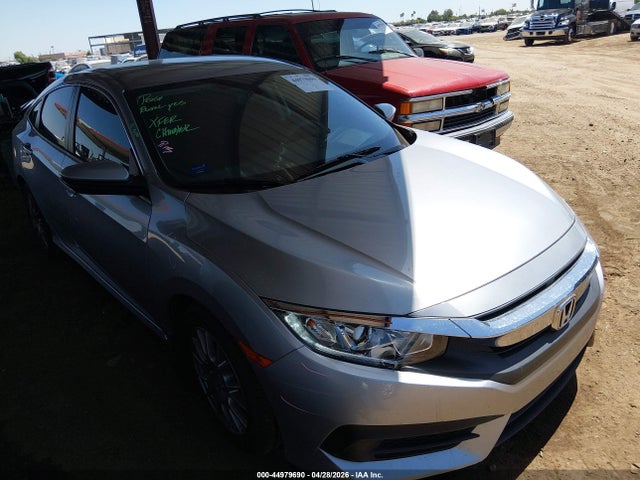 Продажа на аукционе авто 2017 Honda Civic Lx, vin: 19XFC2F5XHE062783, номер лота: 44979690
