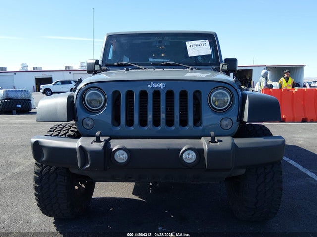 1C4HJWDG2EL271061 Jeep Wrangler Unlimited Sport