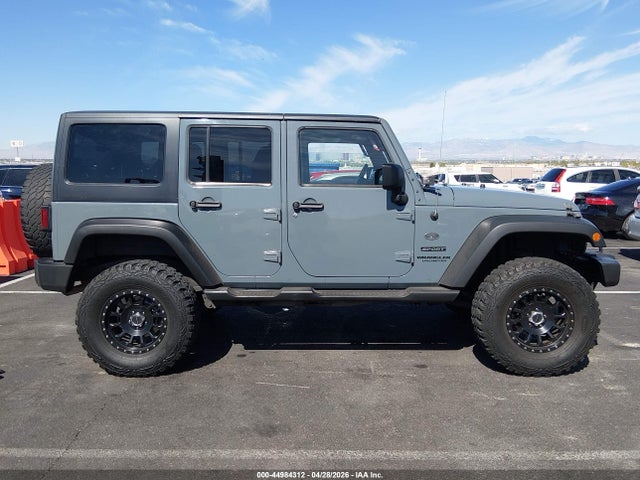 1C4HJWDG2EL271061 Jeep Wrangler Unlimited Sport