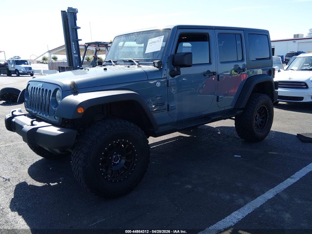 1C4HJWDG2EL271061 Jeep Wrangler Unlimited Sport