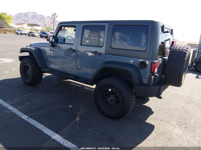 1C4HJWDG2EL271061 Jeep Wrangler Unlimited Sport