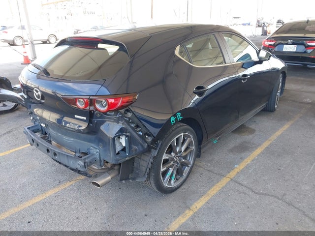 JM1BPAKL9M1307667 Mazda Mazda3 Select