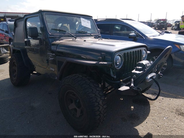 Auction sale of the 2000 Jeep Wrangler Sport, vin: 1J4FA49S4YP717338, lot number: 44987482