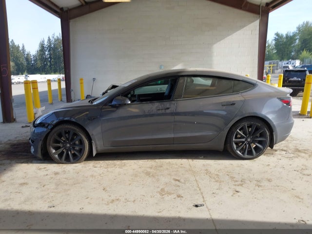 44990082 :رقم المزاد ، 5YJ3E1EAXMF987185 vin ، 2021 Tesla Model 3 Standard Range Plus Rear-wheel Drive مزاد بيع