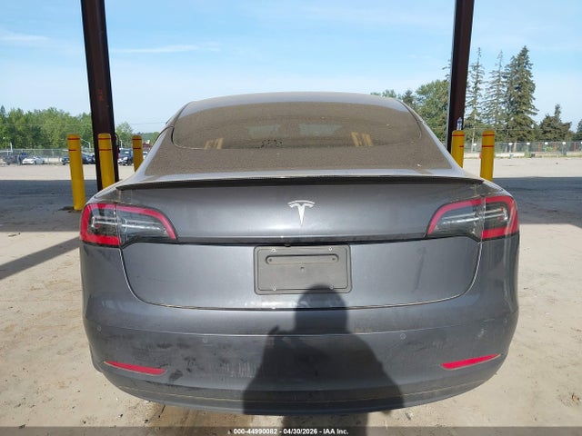 44990082 :رقم المزاد ، 5YJ3E1EAXMF987185 vin ، 2021 Tesla Model 3 Standard Range Plus Rear-wheel Drive مزاد بيع