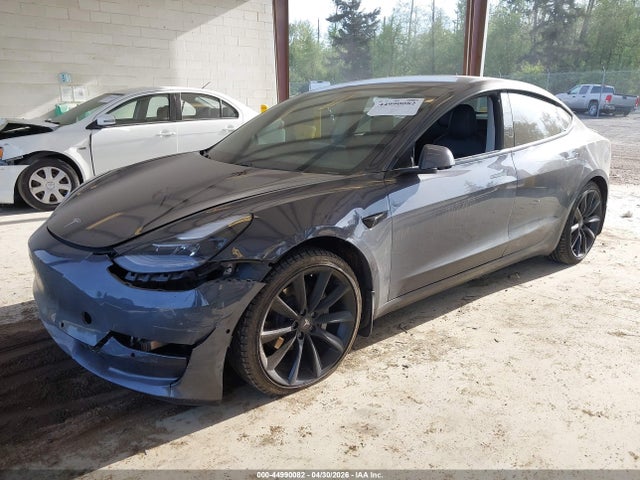 44990082 :رقم المزاد ، 5YJ3E1EAXMF987185 vin ، 2021 Tesla Model 3 Standard Range Plus Rear-wheel Drive مزاد بيع