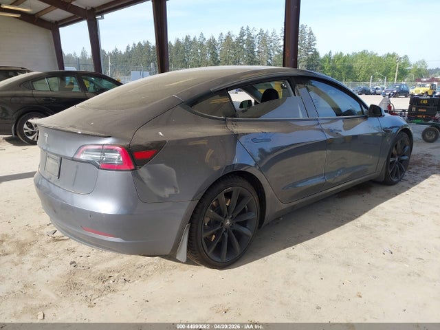 44990082 :رقم المزاد ، 5YJ3E1EAXMF987185 vin ، 2021 Tesla Model 3 Standard Range Plus Rear-wheel Drive مزاد بيع