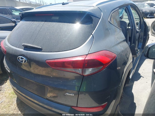 KM8J3CA46GU053931 Hyundai TUCSON SE