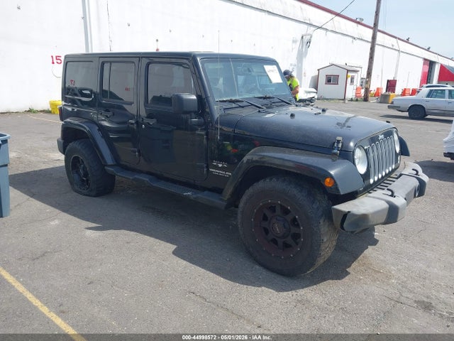 Jeep Wrangler Unlimited Sahara 2016 1C4BJWEG9GL321669 головне зображення