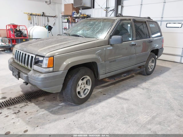 Auction sale of the 1997 Jeep Grand Cherokee Laredo/tsi, vin: 1J4FX58SXVC719362, lot number: 45001509