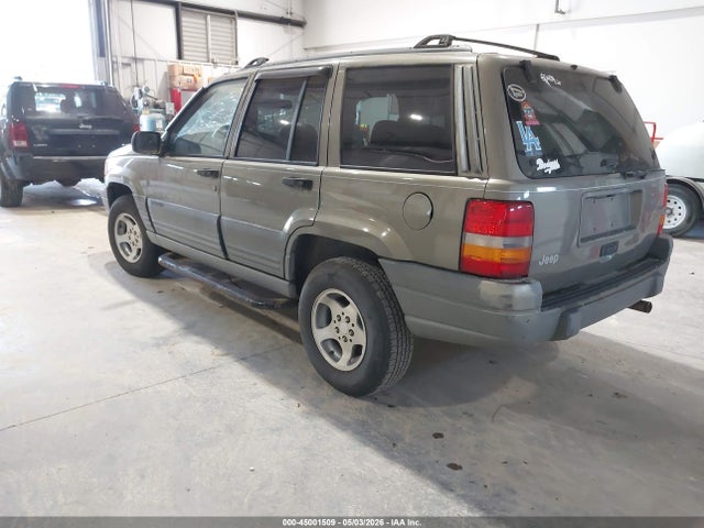 Auction sale of the 1997 Jeep Grand Cherokee Laredo/tsi, vin: 1J4FX58SXVC719362, lot number: 45001509