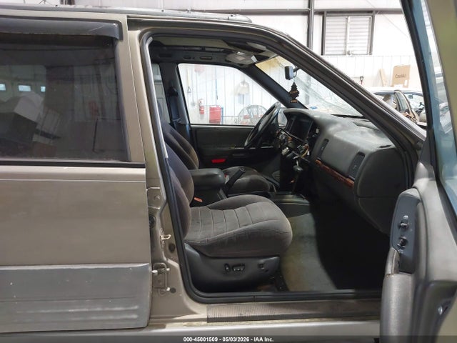 Auction sale of the 1997 Jeep Grand Cherokee Laredo/tsi, vin: 1J4FX58SXVC719362, lot number: 45001509