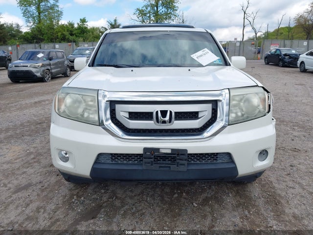 2011 Honda Pilot Touring მანქანა იყიდება აუქციონზე, vin: 5FNYF3H94BB027924, აუქციონის ნომერი: 45003619