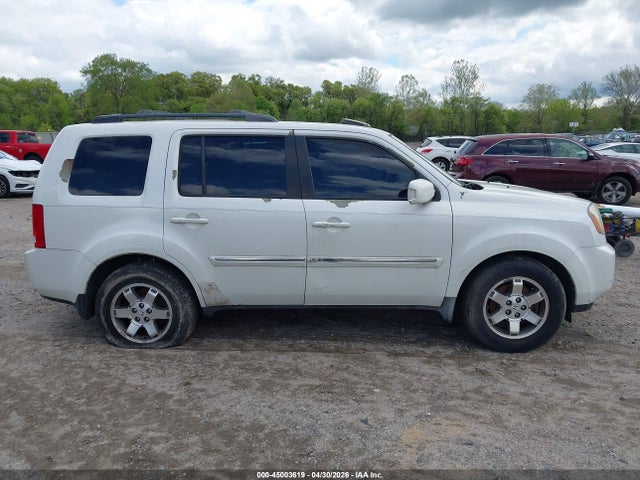 2011 Honda Pilot Touring მანქანა იყიდება აუქციონზე, vin: 5FNYF3H94BB027924, აუქციონის ნომერი: 45003619