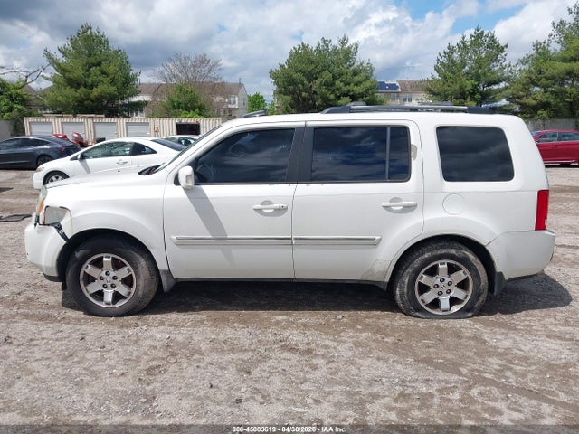 2011 Honda Pilot Touring მანქანა იყიდება აუქციონზე, vin: 5FNYF3H94BB027924, აუქციონის ნომერი: 45003619