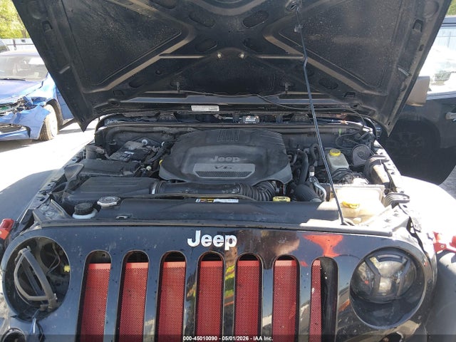 1C4BJWDG9EL211896 Jeep Wrangler Unlimited Sport