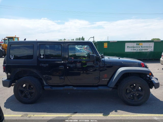 1C4BJWDG9EL211896 Jeep Wrangler Unlimited Sport