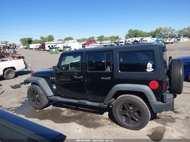 1C4BJWDG9EL211896 Jeep Wrangler Unlimited Sport