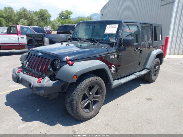 1C4BJWDG9EL211896 Jeep Wrangler Unlimited Sport