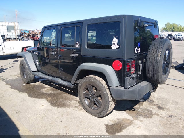 1C4BJWDG9EL211896 Jeep Wrangler Unlimited Sport