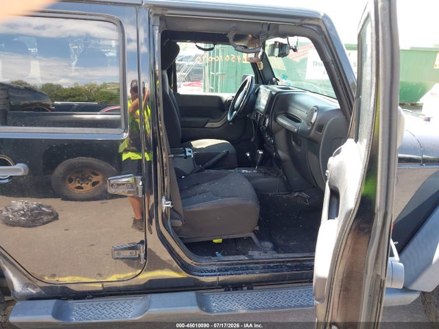1C4BJWDG9EL211896 Jeep Wrangler Unlimited Sport