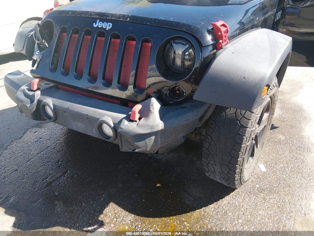 1C4BJWDG9EL211896 Jeep Wrangler Unlimited Sport