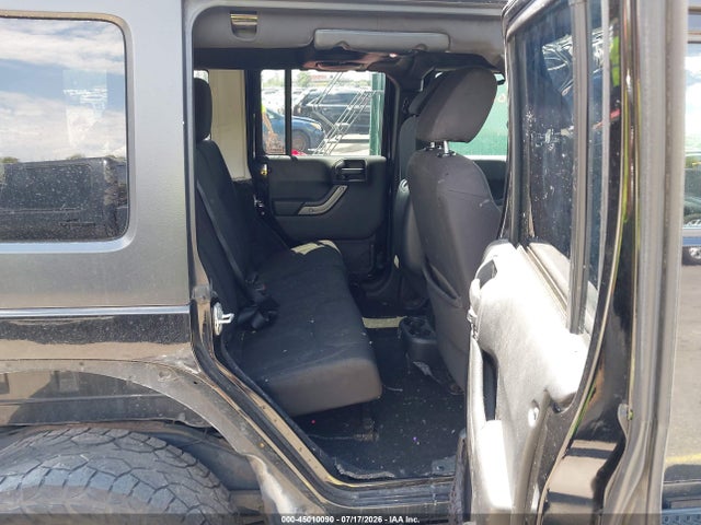 1C4BJWDG9EL211896 Jeep Wrangler Unlimited Sport