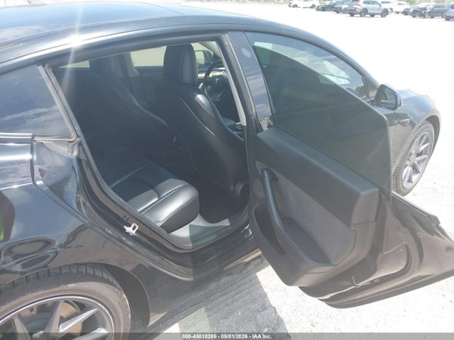 2021 Tesla Model 3 Standard Range Plus Rear-wheel Drive მანქანა იყიდება აუქციონზე, vin: 5YJ3E1EA4MF087964, აუქციონის ნომერი: 45010285