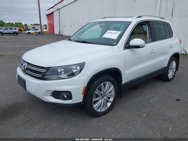 2014 Volkswagen Tiguan Sel მანქანა იყიდება აუქციონზე, vin: WVGBV3AX9EW580002, აუქციონის ნომერი: 45015567