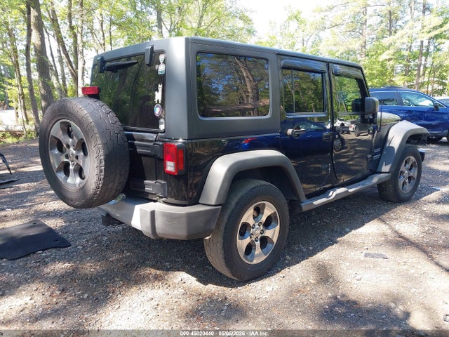 45020440 :رقم المزاد ، 1C4BJWDG2FL694049 vin ، 2015 Jeep Wrangler Unlimited Sport مزاد بيع