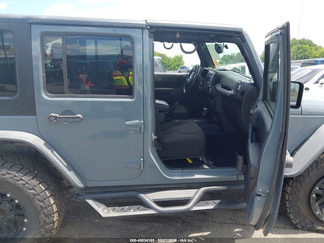 45034165 :رقم المزاد ، 1C4BJWDG5FL546767 vin ، 2015 Jeep Wrangler Unlimited Sport مزاد بيع