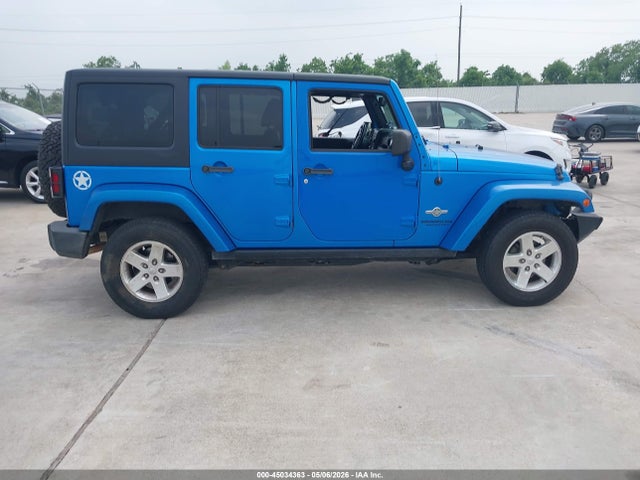 1C4BJWDG7EL222802 Jeep Wrangler Unlimited Freedom Edition