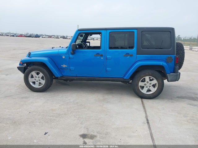1C4BJWDG7EL222802 Jeep Wrangler Unlimited Freedom Edition