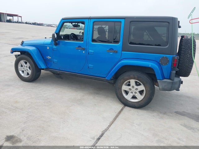1C4BJWDG7EL222802 Jeep Wrangler Unlimited Freedom Edition