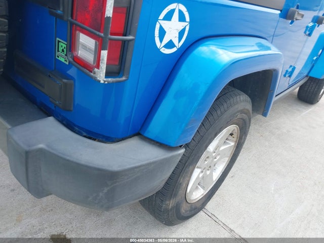1C4BJWDG7EL222802 Jeep Wrangler Unlimited Freedom Edition