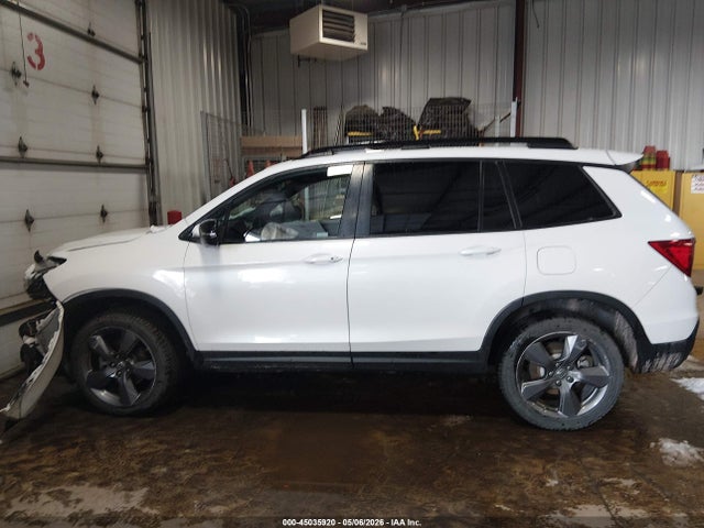 5FNYF8H90MB007184 Honda Passport Awd Touring