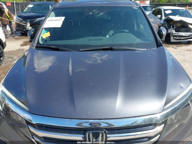 2016 Honda Pilot Touring მანქანა იყიდება აუქციონზე, vin: 5FNYF6H94GB052217, აუქციონის ნომერი: 45036849