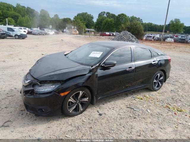 2017 Honda Civic Touring მანქანა იყიდება აუქციონზე, vin: 19XFC1F9XHE031482, აუქციონის ნომერი: 45039247