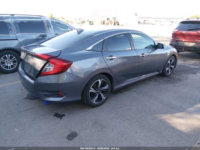 45039314 :رقم المزاد ، 19XFC1F92HE010738 vin ، 2017 Honda Civic Touring مزاد بيع