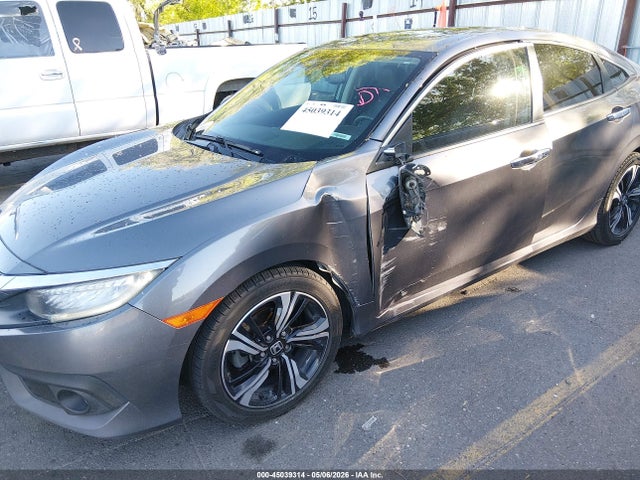 45039314 :رقم المزاد ، 19XFC1F92HE010738 vin ، 2017 Honda Civic Touring مزاد بيع