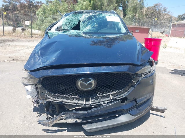 2021 Mazda Cx-5 Touring მანქანა იყიდება აუქციონზე, vin: JM3KFACM1M0412257, აუქციონის ნომერი: 45043992