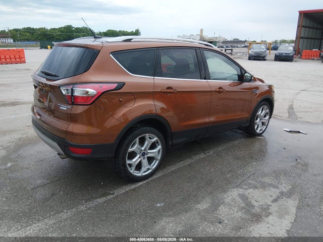 Продажа на аукционе авто 2017 Ford Escape Titanium, vin: 1FMCU0J91HUB59012, номер лота: 45063688