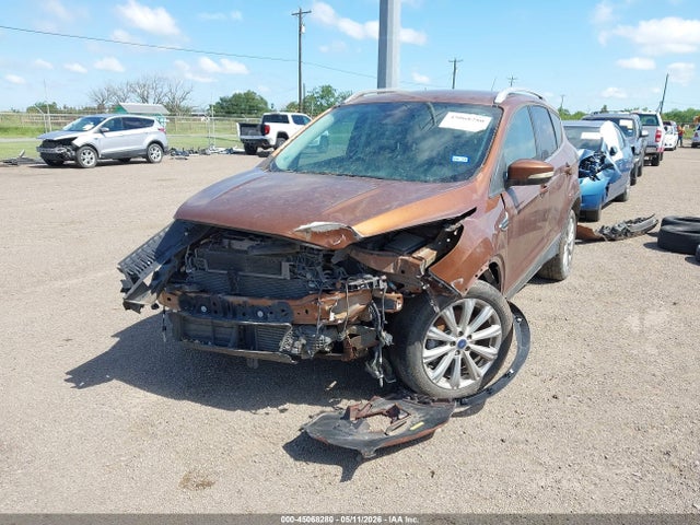 45068280 :رقم المزاد ، 1FMCU0J97HUA93372 vin ، 2017 Ford Escape Titanium مزاد بيع