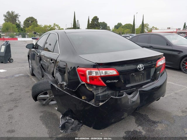 4T1BF1FK1EU857722 Toyota CAMRY SE