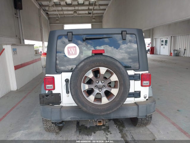 45069309 :رقم المزاد ، 1C4HJWDG8EL177444 vin ، 2014 Jeep Wrangler Unlimited Sport مزاد بيع
