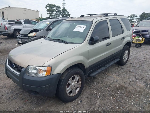 45070030 :رقم المزاد ، 1FMCU03114KA41233 vin ، 2004 Ford Escape Xlt مزاد بيع